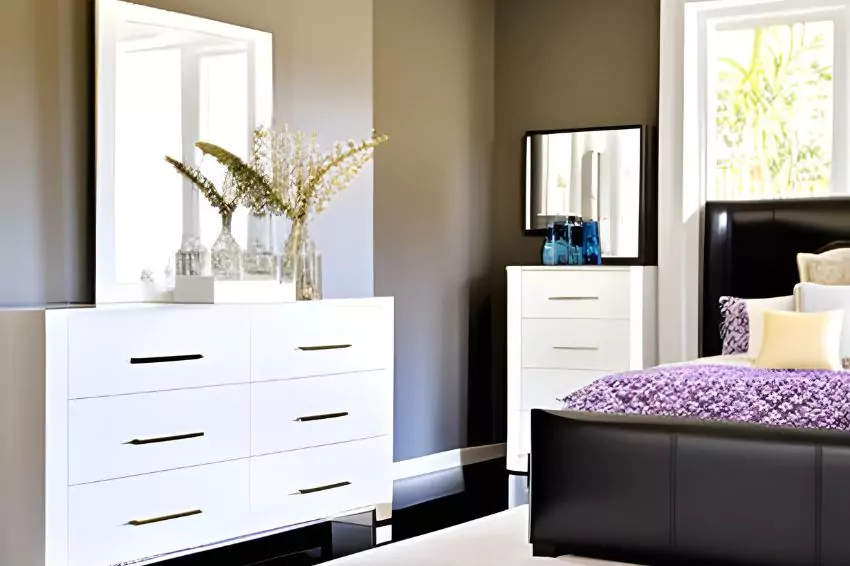 white dresser with black bed