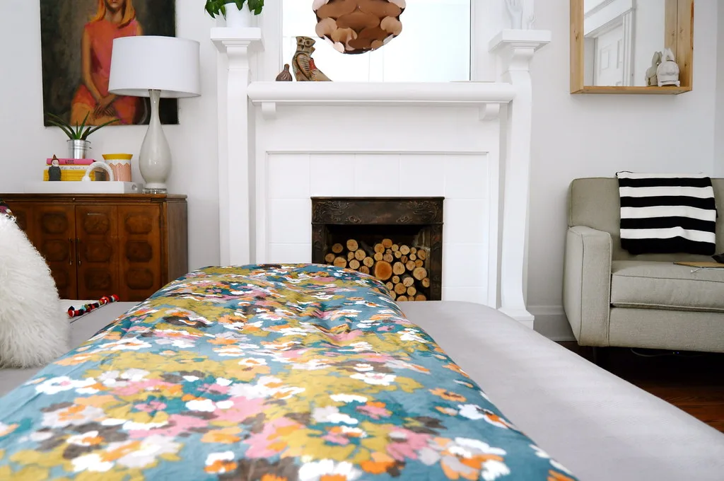 Close-up of bedroom curtain panels being measured for privacy coverage