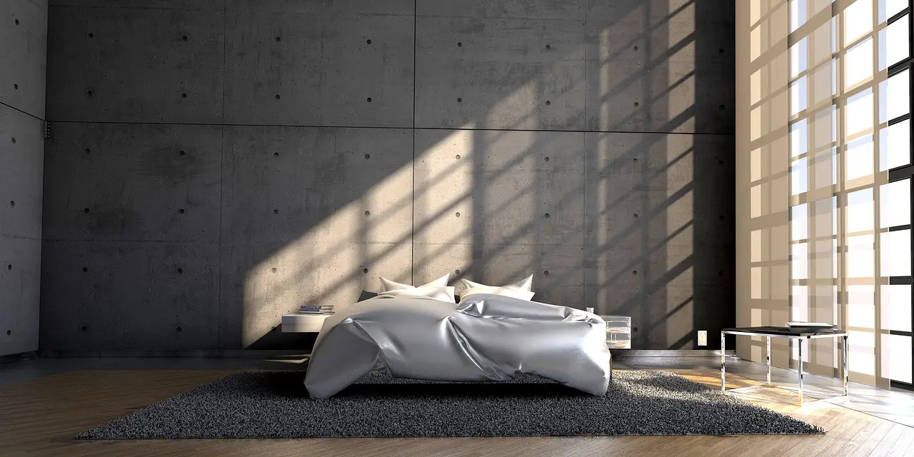 Centered bed with wall-mounted storage: best for square rooms