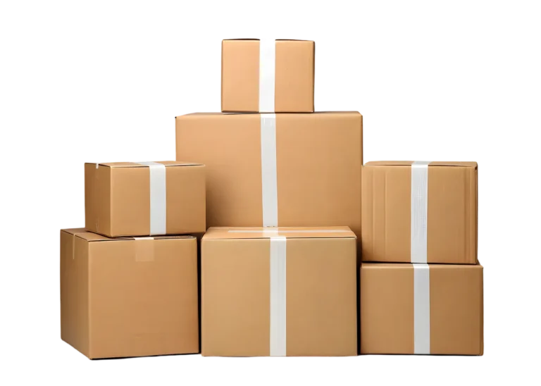 Shipping box with paper dividers beside stacked white dishes on a packing table