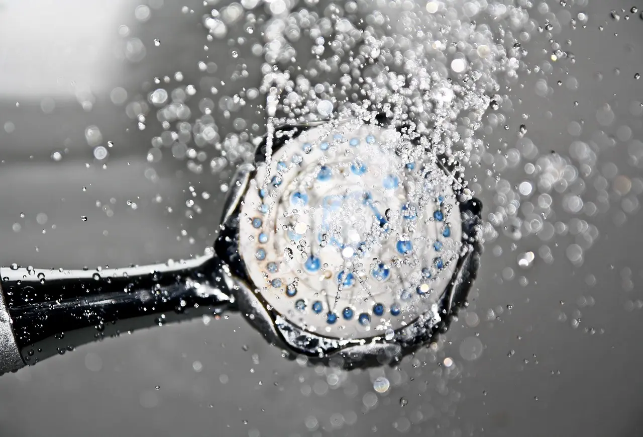 Does a shower door keep water in better than a liner?