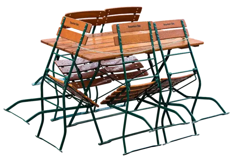 Balcony folding chair open on a small balcony with space to walk around it