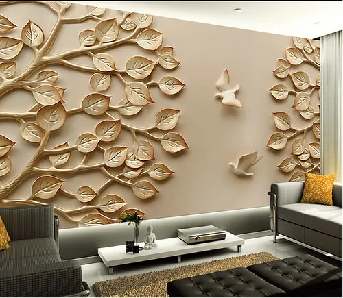 A hand measures spacing beside framed art samples for Best Bedroom Wall Art Ideas for Blank Walls