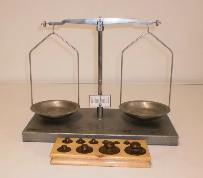 Cuisinart cookware pieces on a kitchen counter as a home cook compares pan materials and finishes