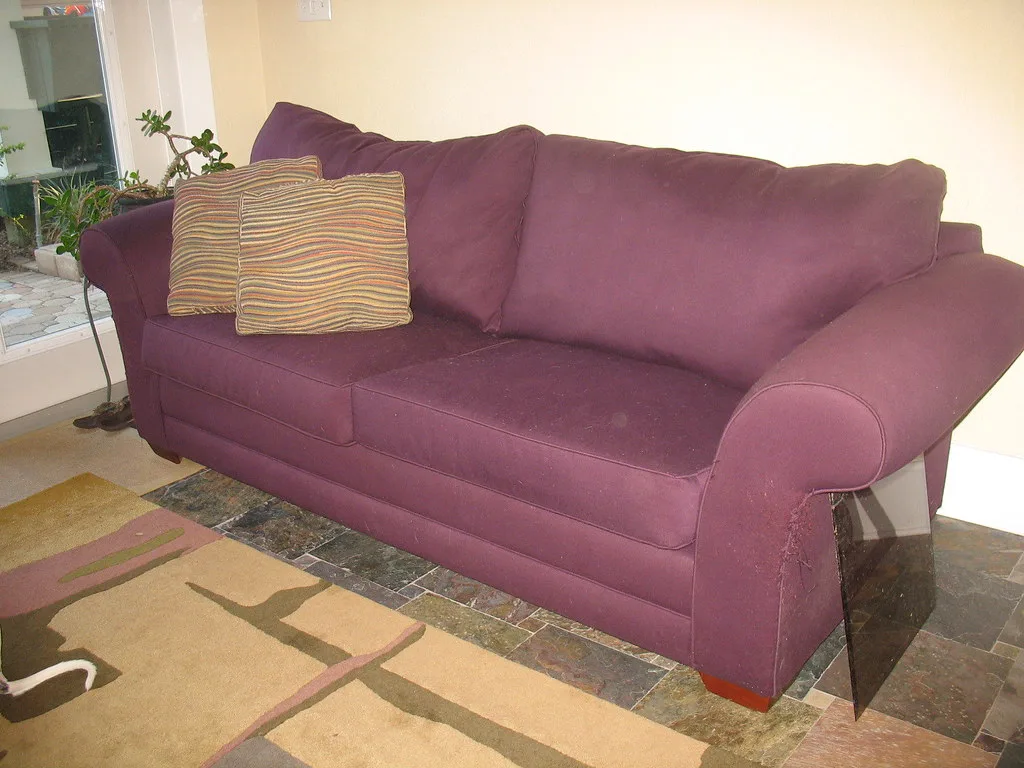 Flexsteel sleeper sofa in a real living room beside a guest bed setup