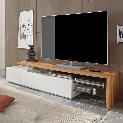 IKEA BESTÅ TV stand in a modern living room with wall-mounted TV and modular storage