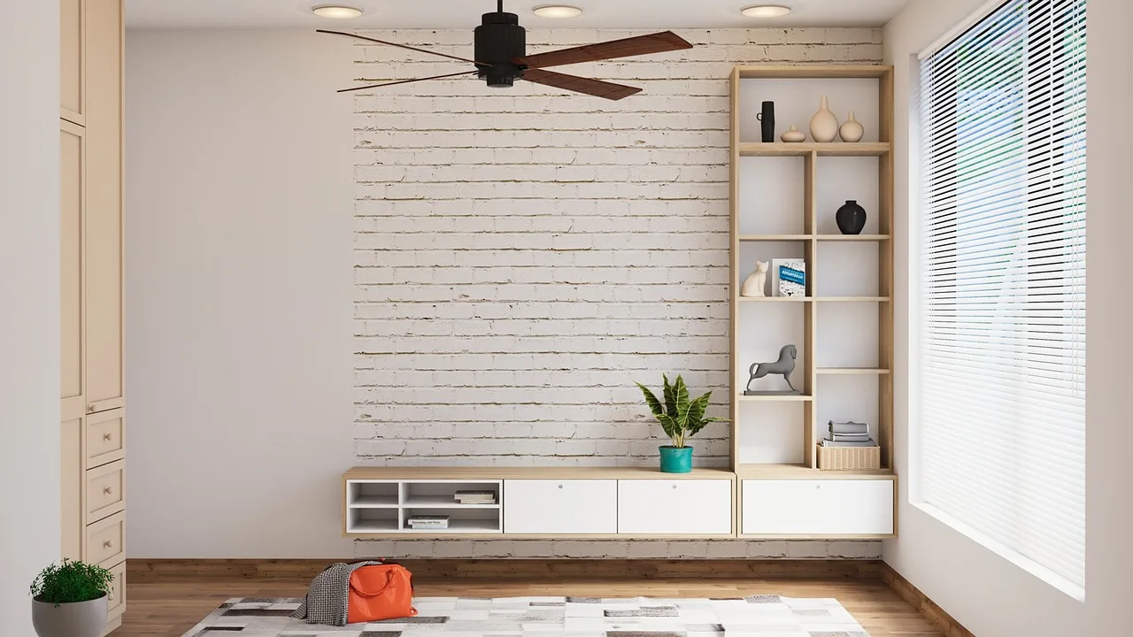 Modern Forms ceiling fan above a bright modern living room with minimalist furniture