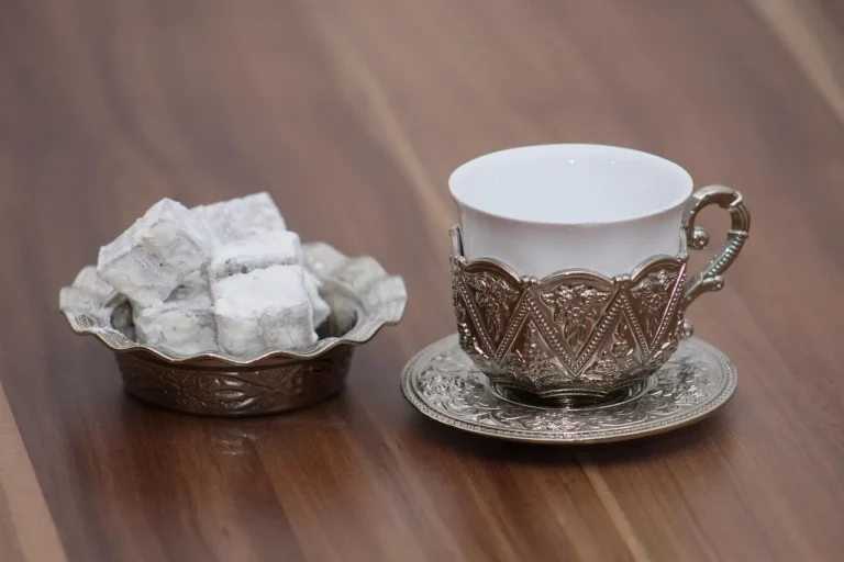 Ramadan Recipe Box with recipe cards, dates, spices, and a meal schedule on a kitchen table