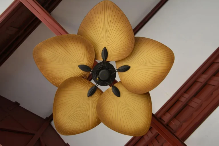 Sofucor ceiling fan mounted close to the ceiling in a small living room with natural daylight